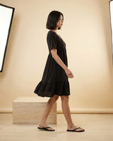 Relaxed V-Neck Ruffle Hem Mini Dress in Black, walking view – Petopet