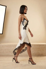 Lace Trim Asymmetric Satin Slip Mini Dress in Black, walking view – Petopet
